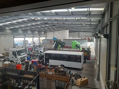Workshop full of trucks